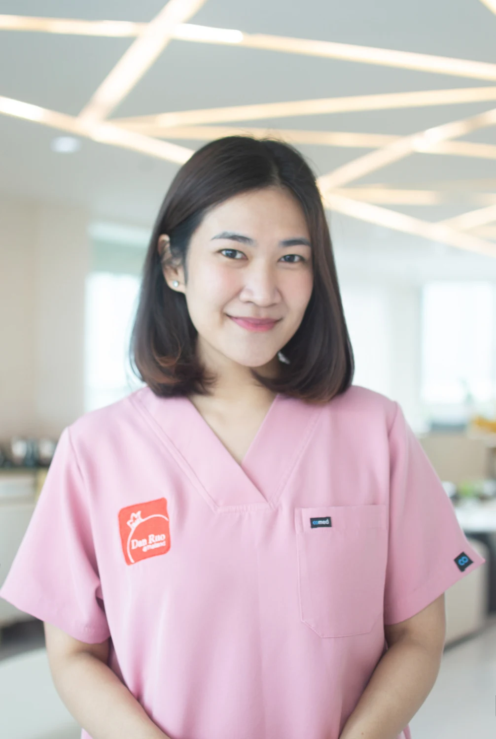 Nawaporn Duangprapat in Dan Ruo clinic uniform